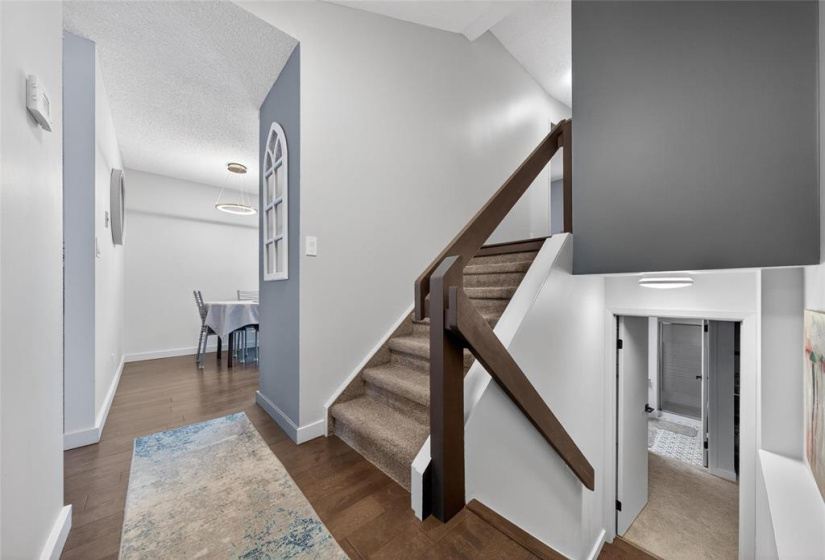 Stairs to the Main Lower Level PLUS a large Basement! This home is spacious!