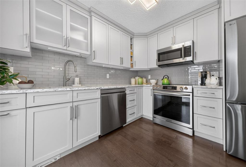 Fully Renovated Kitchen with an abundance of convenient cabinets and drawers