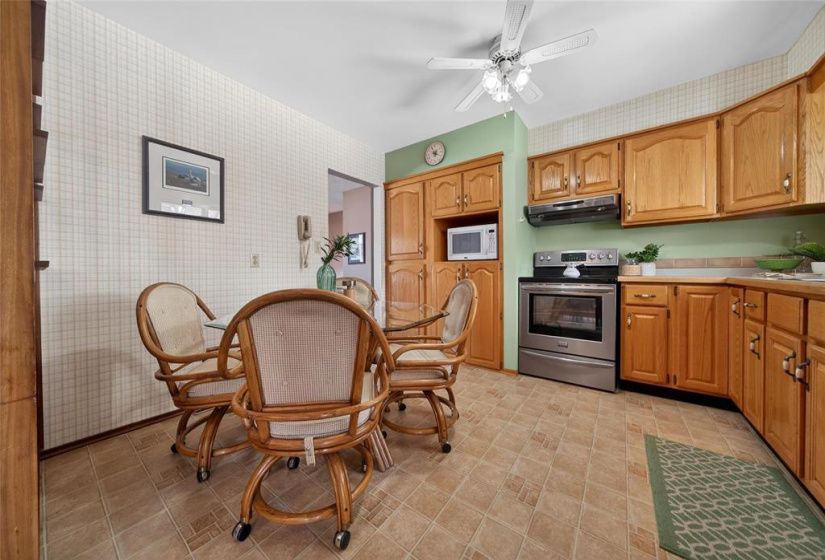 Spacious eat-in kitchen with SS appliances.