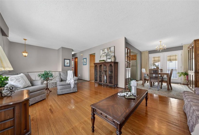 L-shaped living and dining room.