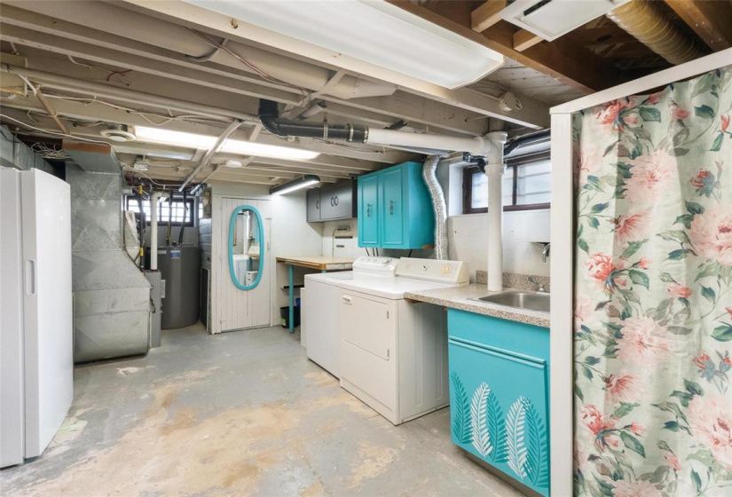 Utility and laundry room with separate sink and shower