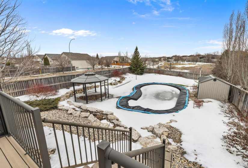 Incredible backyard with pool, concrete patio and Gazebo.