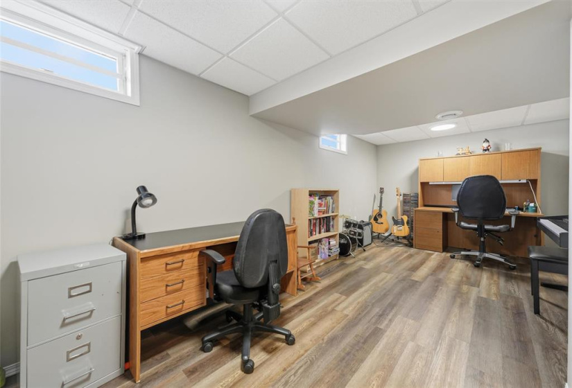 Bonus office/den/studio space downstairs.