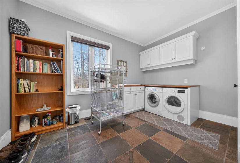 Mudroom & laundry off of dining room.
