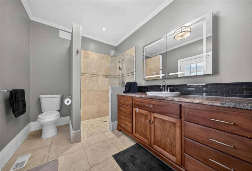 Primary ensuite with walk-in shower & heated floors.
