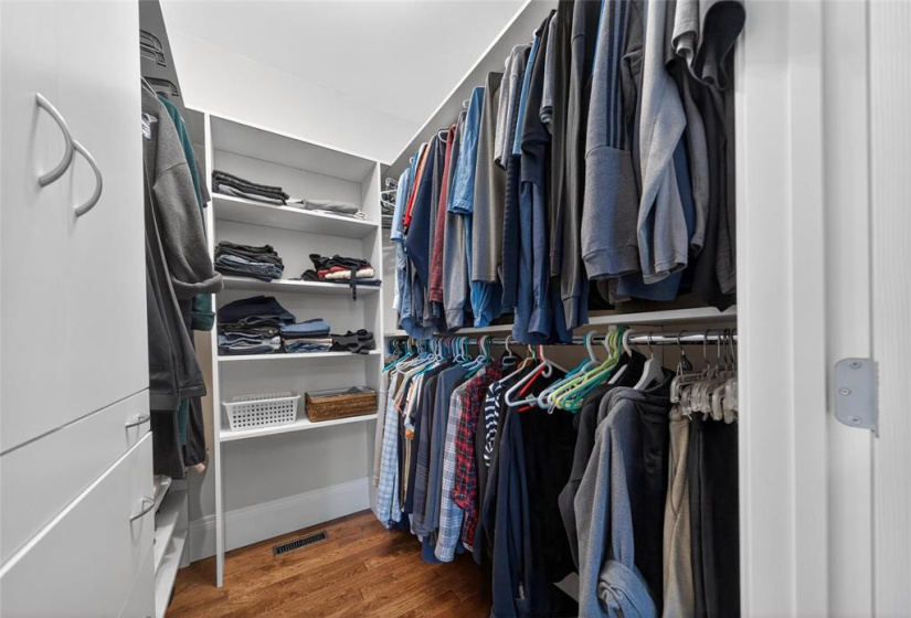 Primary walk-in closet.