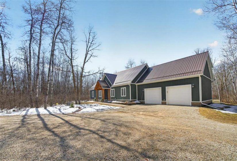 Double attached garage with loft space above.