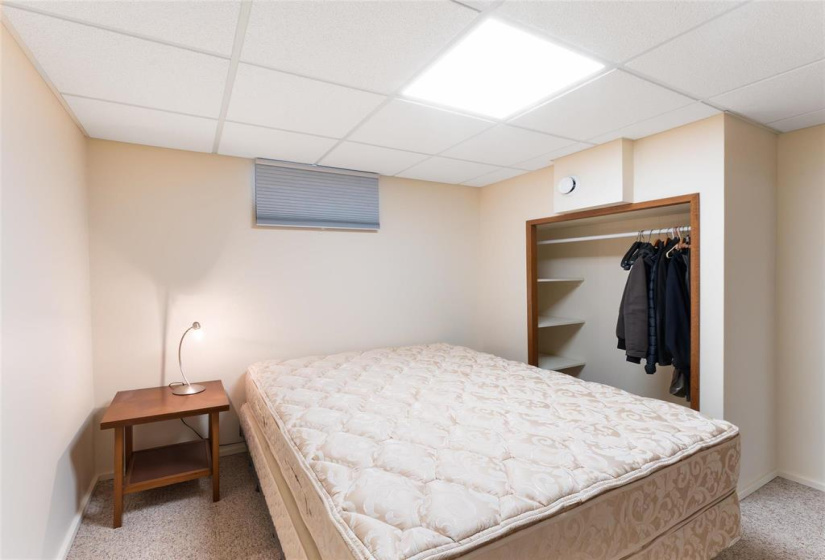 Basement bedroom. Window does not meet egress