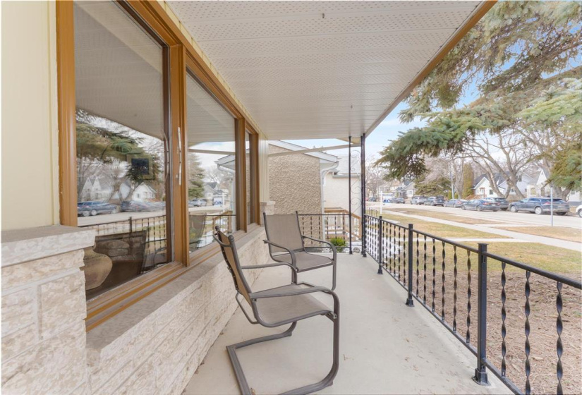 Great front porch to enjoy the activity going by.