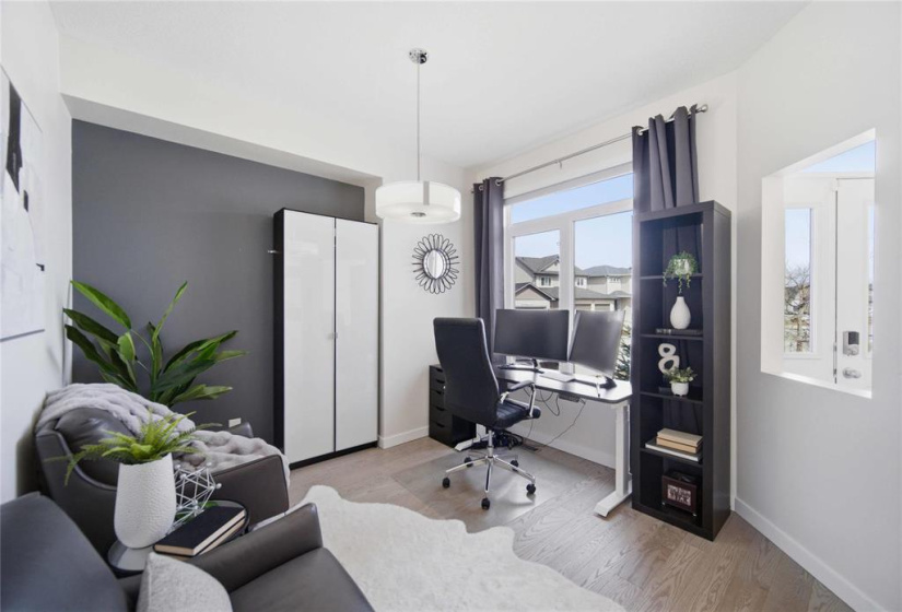 Need to take a Zoom call or hide the toys? The main floor flex space is the versatile MVP you’ve been looking for.