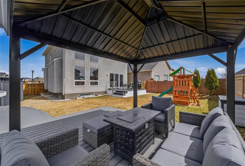 Professionally installed 30' x 15' UV-Filtered Heated Pool with custom composite surround, privacy-screened stairs and expansive pool deck & pergola ('24) - invoices available