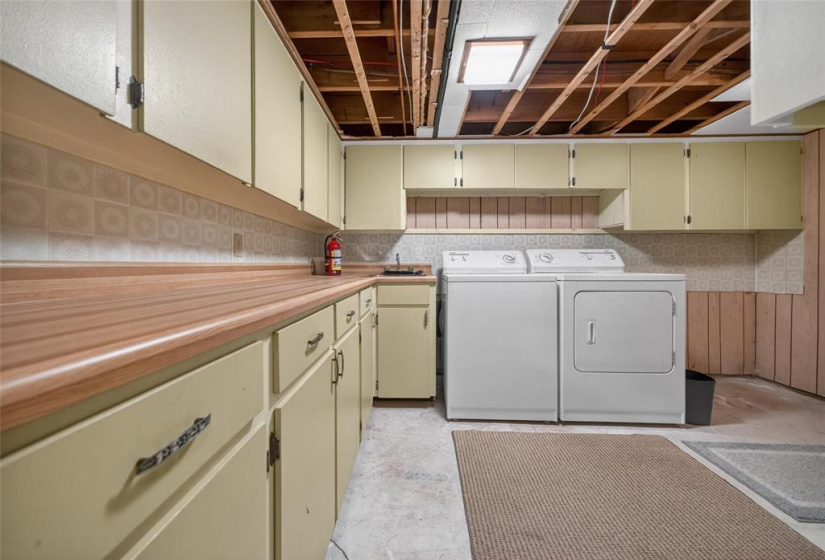 Laundry room with tons of storage.