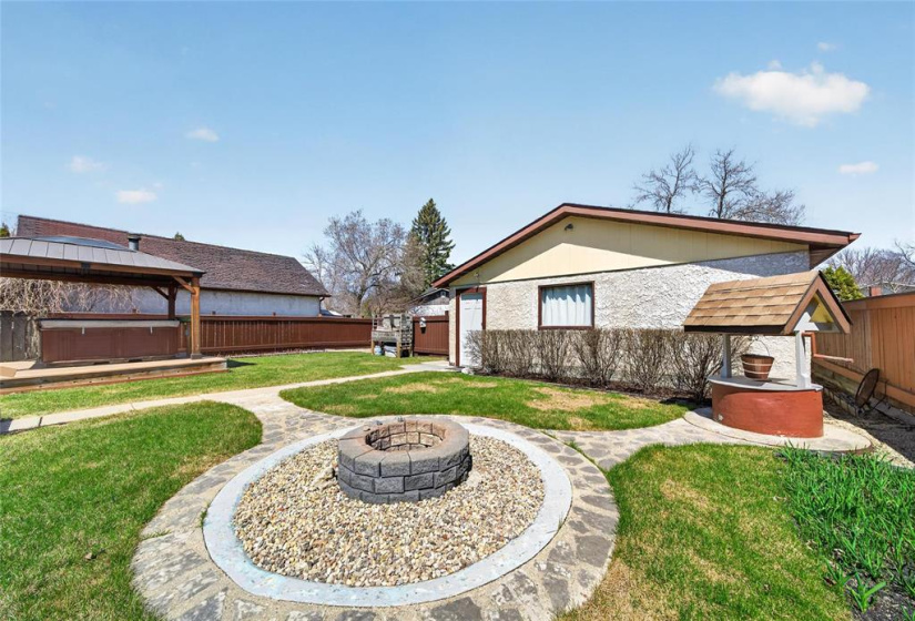 Double attached garage with parking pad at rear of property.