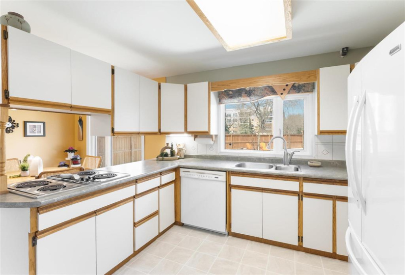 Kitchen with built-in Gen-air stove. Comes with other attachments
