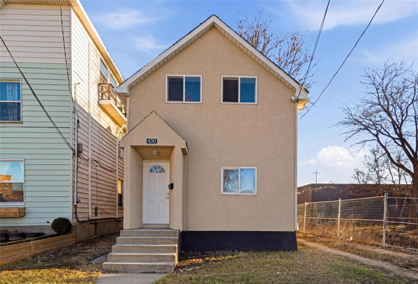 Front Door leads to upper level unit