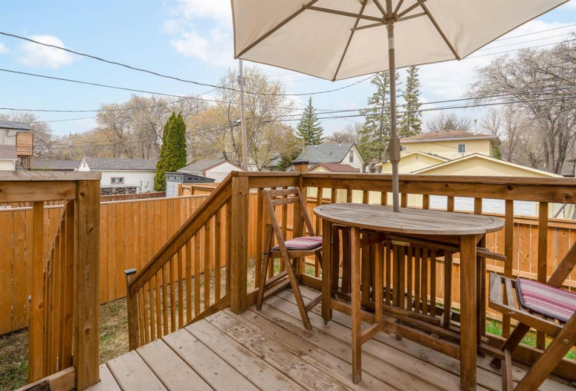 Enjoy BBQing on your deck overlooking the fenced yard