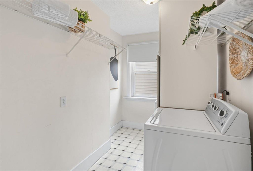 2nd floor laundry with storage tower