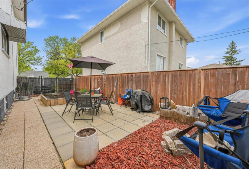 Side yard community garden patio for residents