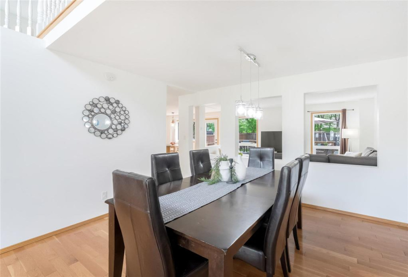 Dining room open to great room and opening to kitchen