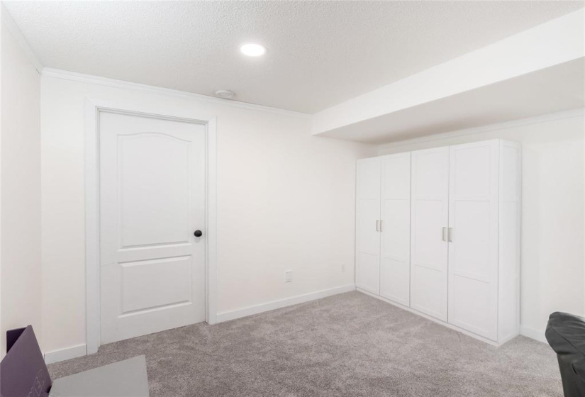 Games area. Door to utility room