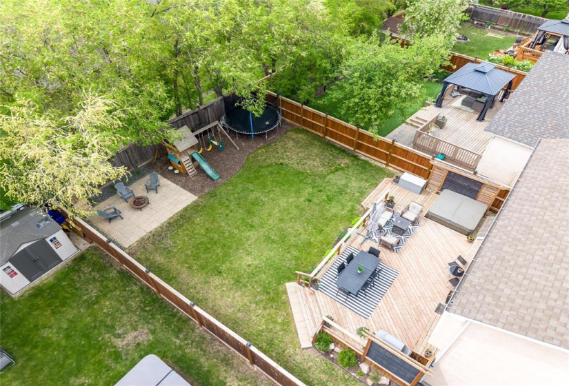 Large fenced West facing back yard