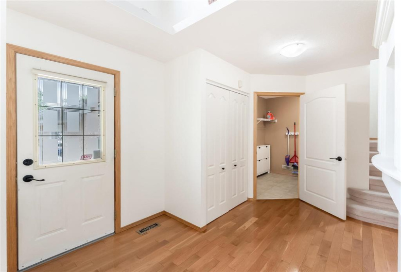 Welcoming front entrance. To the left is the mudroom, garage entrance and main floor laundry