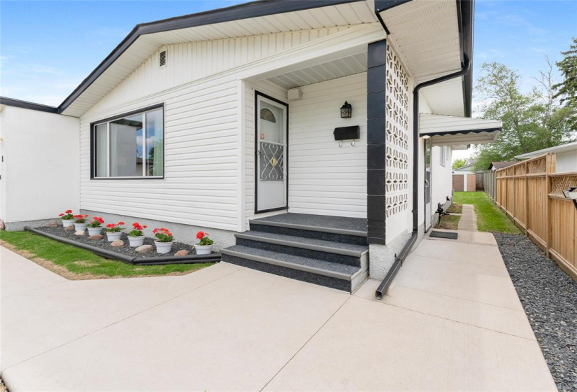 Front and side entrances. Soffits, fascia, eaves updated. Fence is all on their yard and done in 2019