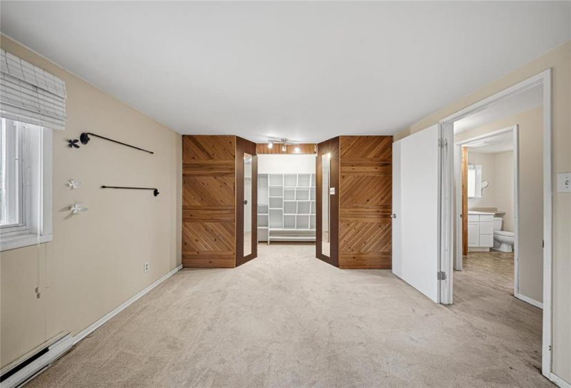 walk in closet primary bedroom