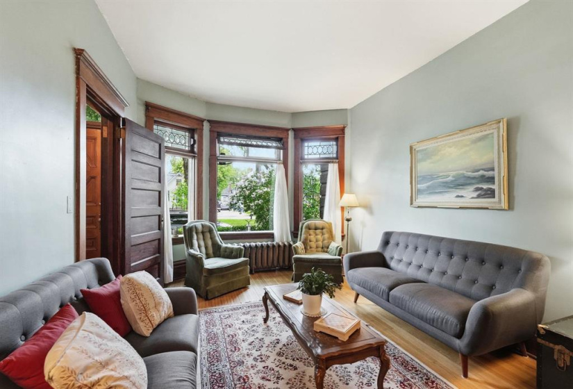 9 foot ceilings and bevelled lead glass bay window