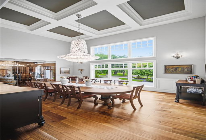 Exquisite trayed ceiling detail with sophisticated crystal chandelier