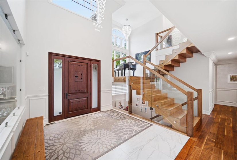 Grand entryway, phenomenal natural light throughout the home