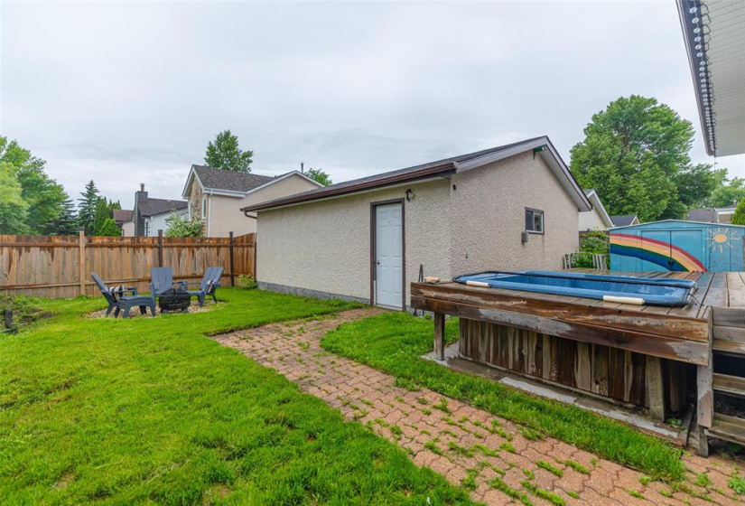 Big Backyard Space with Grass, Deck, Fire Pit Area and Garage