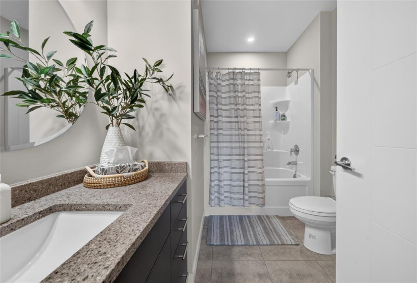 Stunning Main Bathroom with Stone Counters
