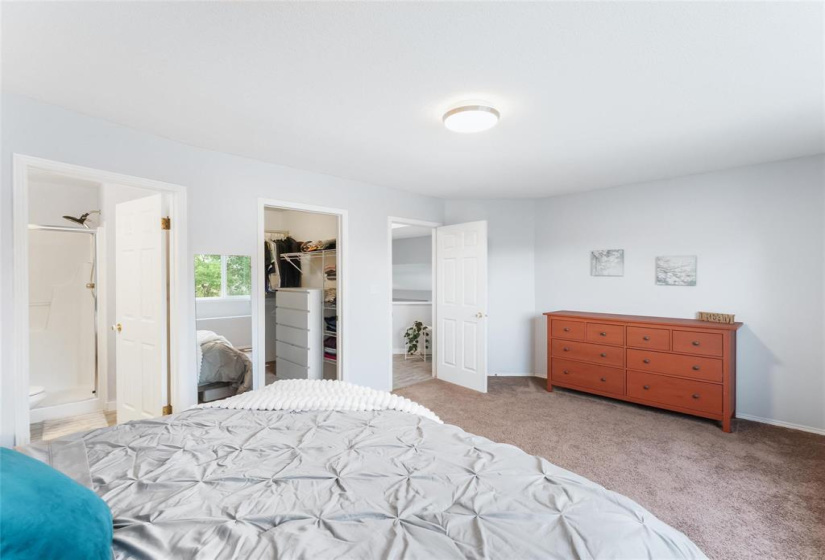 Large primary bedroom with ensuite and walk-in closet