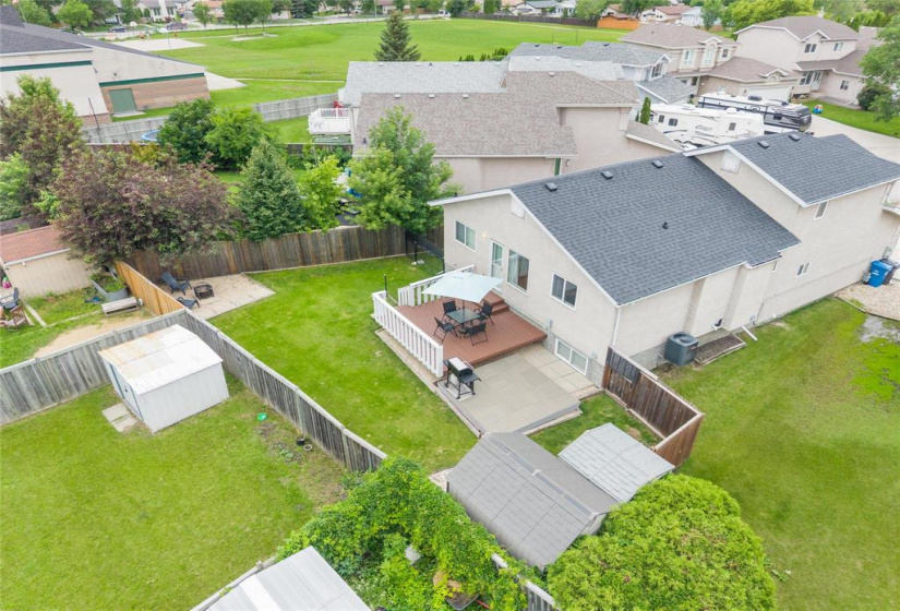 Pie shaped fenced South West facing back yard