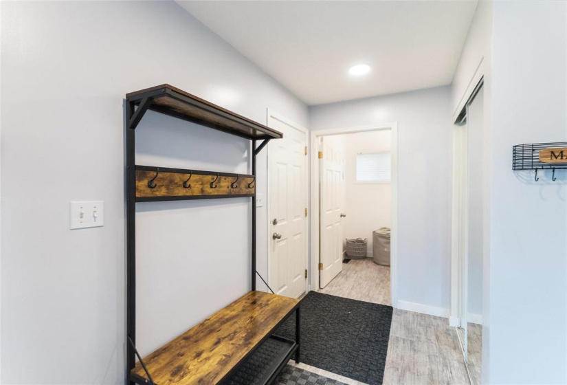 Front entrance. Coat closet, door to garage and laundry room