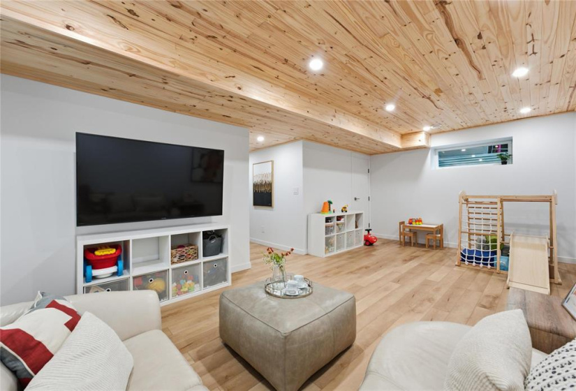 Finished lower level with recroom and potential for 4th bedroom development.