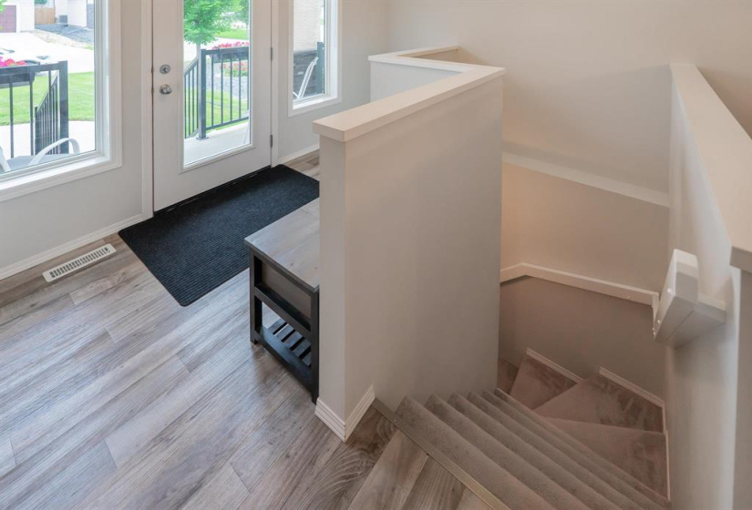 Basement stairs are thoughtfully placed to make sure they don't break up the basement space